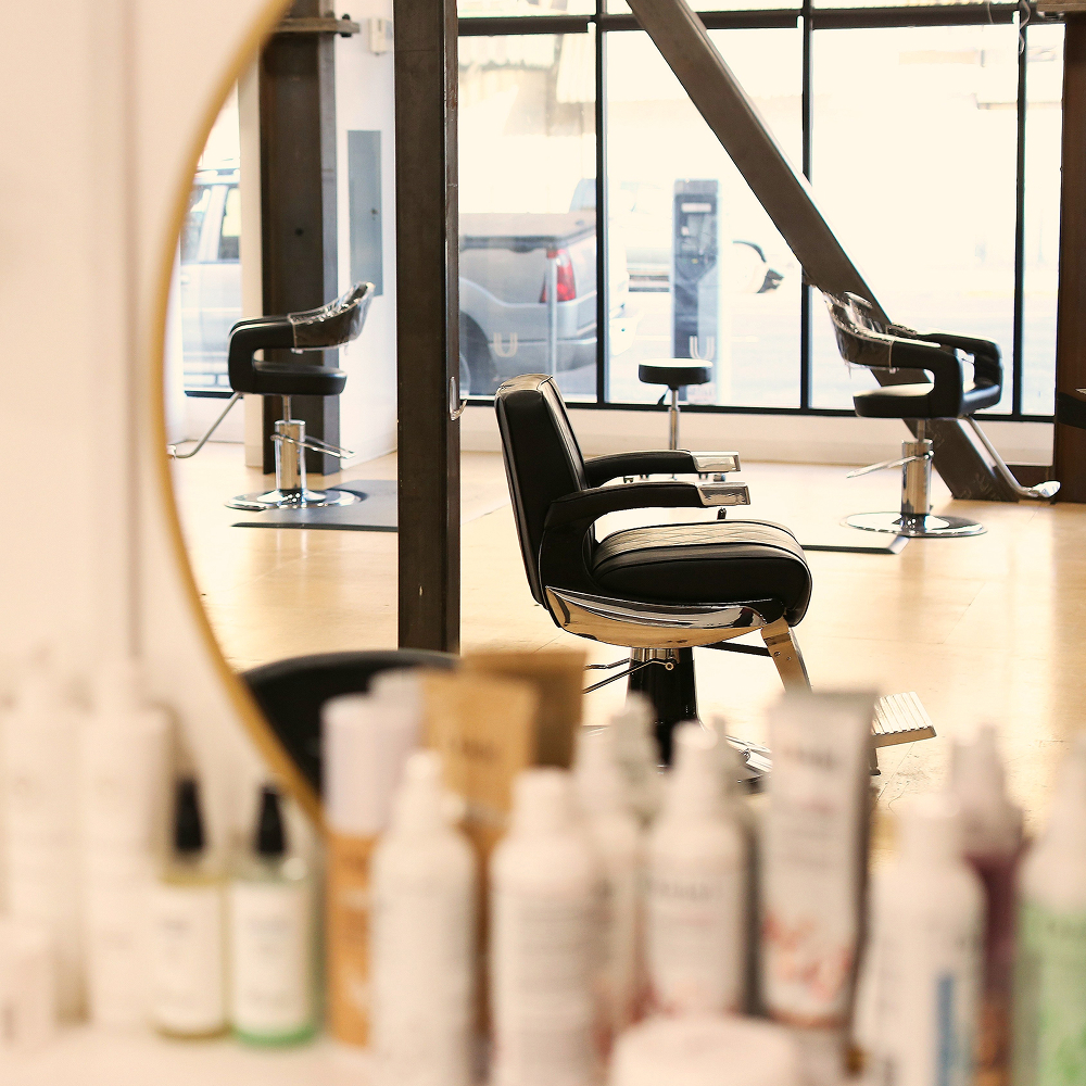 Stylish interior of luxury beauty salon with scent system.