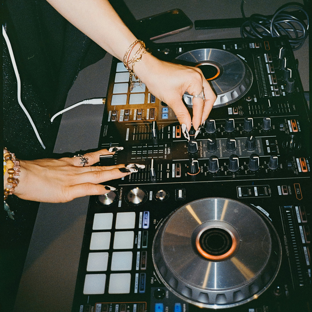 DJ enhancing atmosphere of event with scent experience events