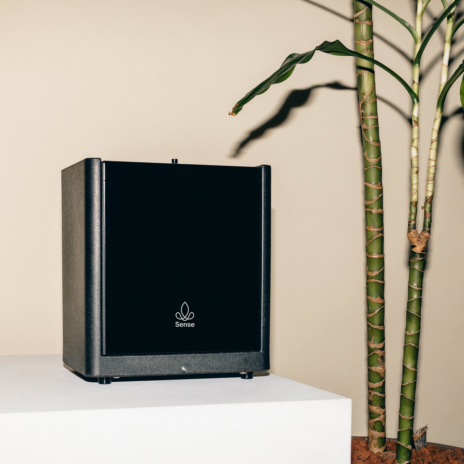 Discreet scent diffuser blending into a tranquil hotel interior