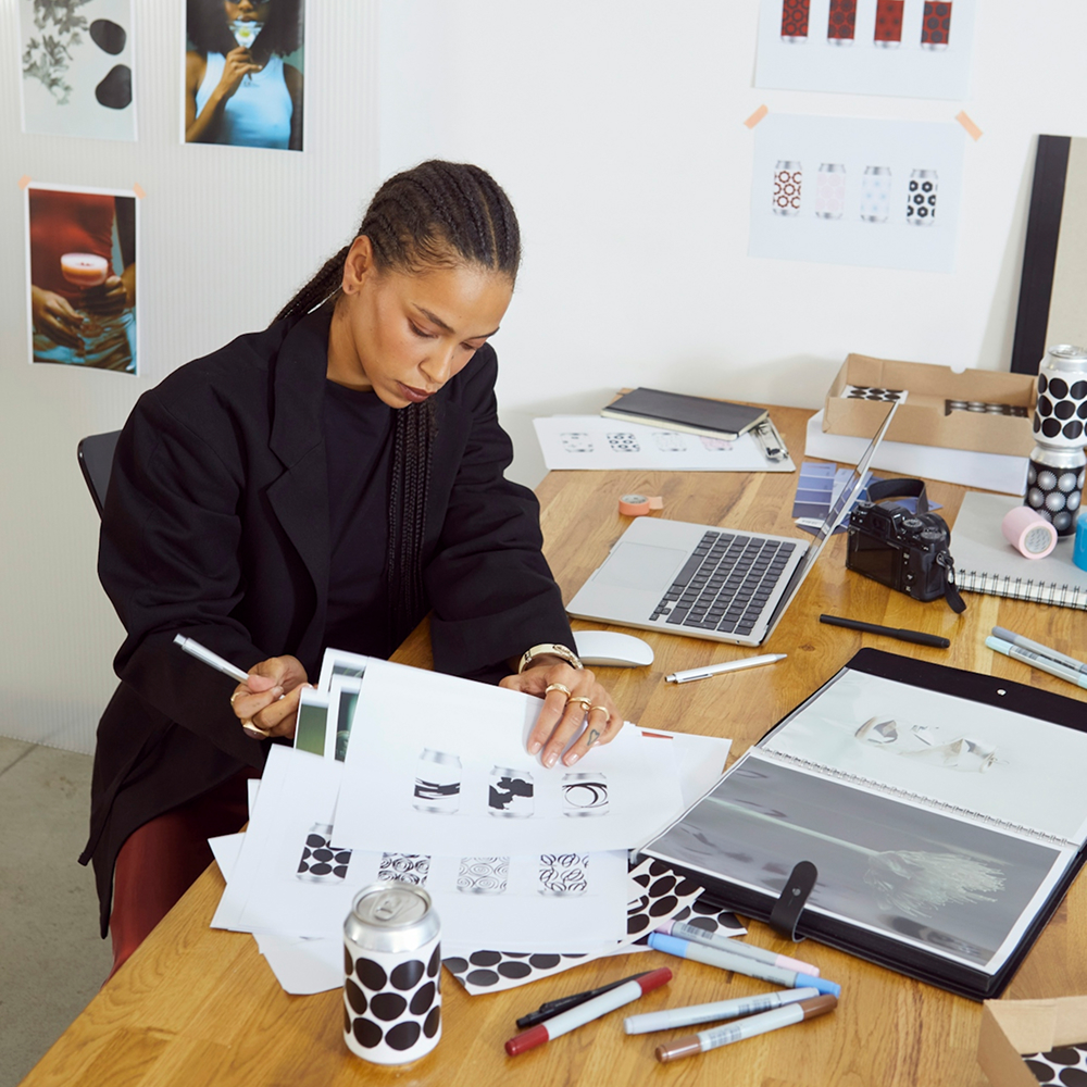 Woman enjoying office scent and focus in the office.