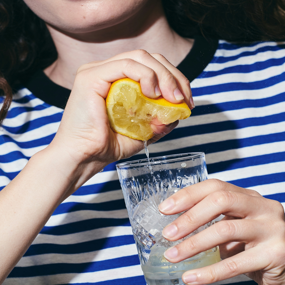 Close-up of lemon representing fresh citrus scent in office environments