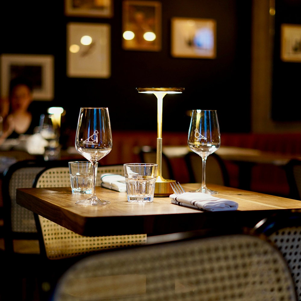 Romantic table for two in a restaurant, enriched by ambient scent for deeper flavor