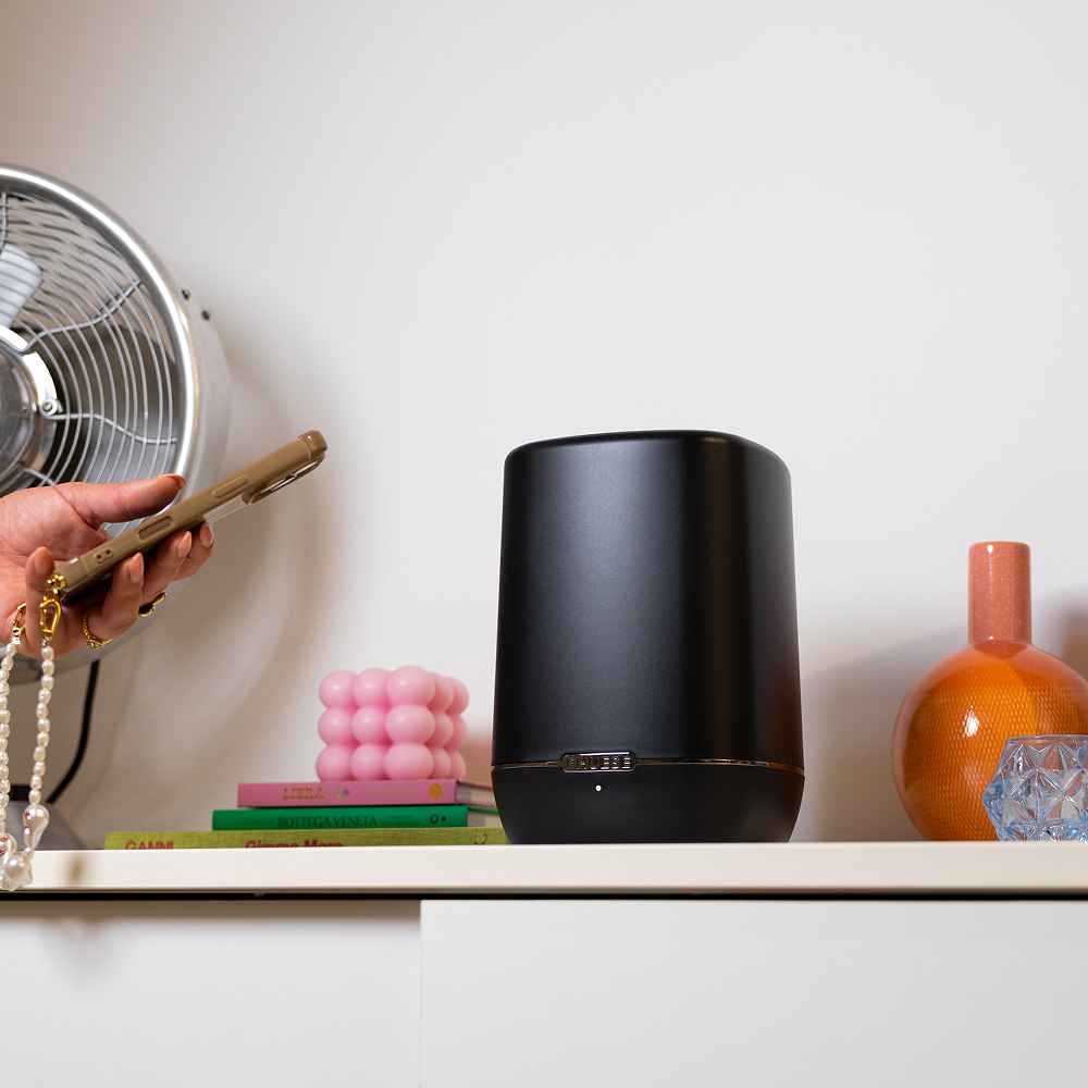 Sense One scent diffuser in action in a retail store