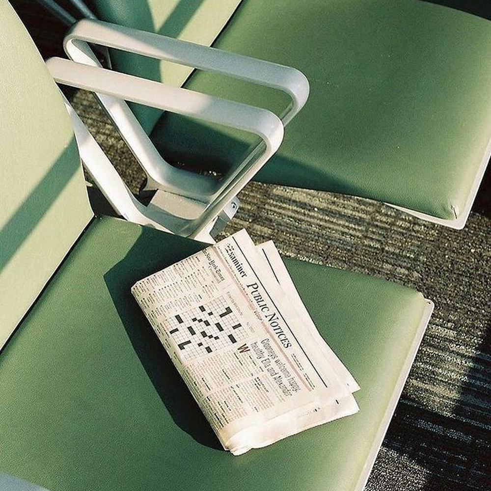 Newspaper on chair in travel hall with fresh scent experience